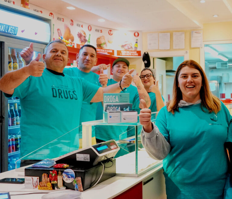 shop owners and staff in t shirts