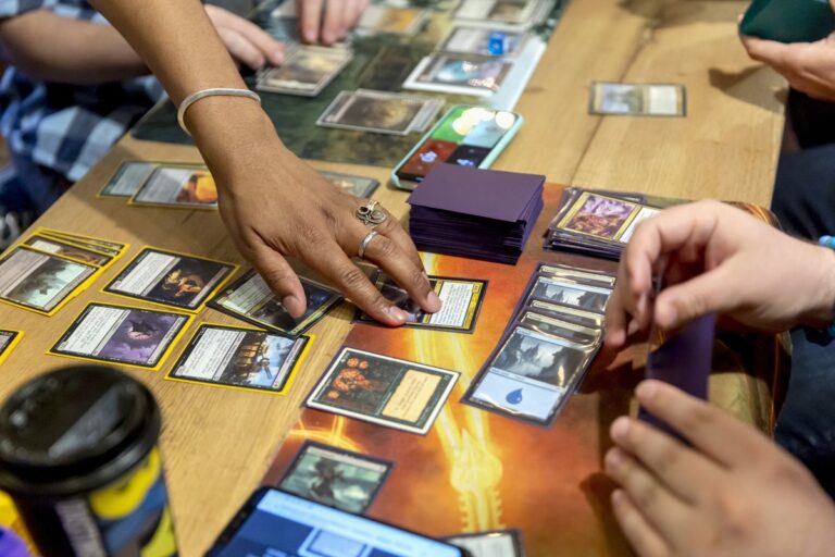 Participants play Magic The Gathering card game